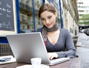 A young attractive woman surfing online